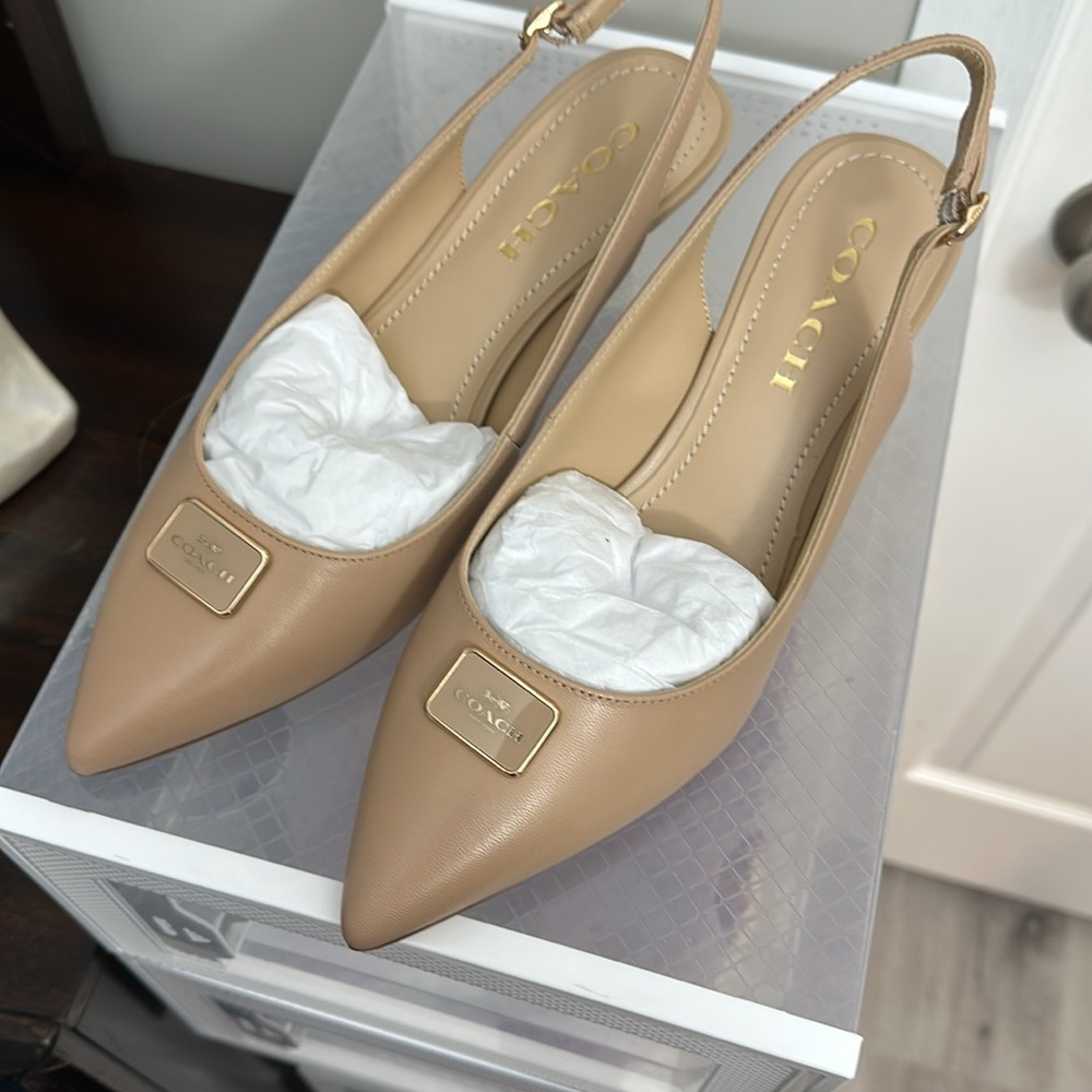 New shoes from Coach. Never worn.